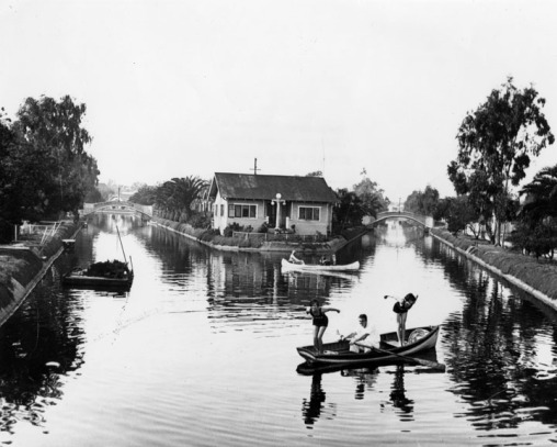Part of the Venice Canals that are now destroyed. Pictured in the middle is "Little America Island" an island where houses existed in the middle of the canals. Photo courtesy of the LMU library.&nbsp;